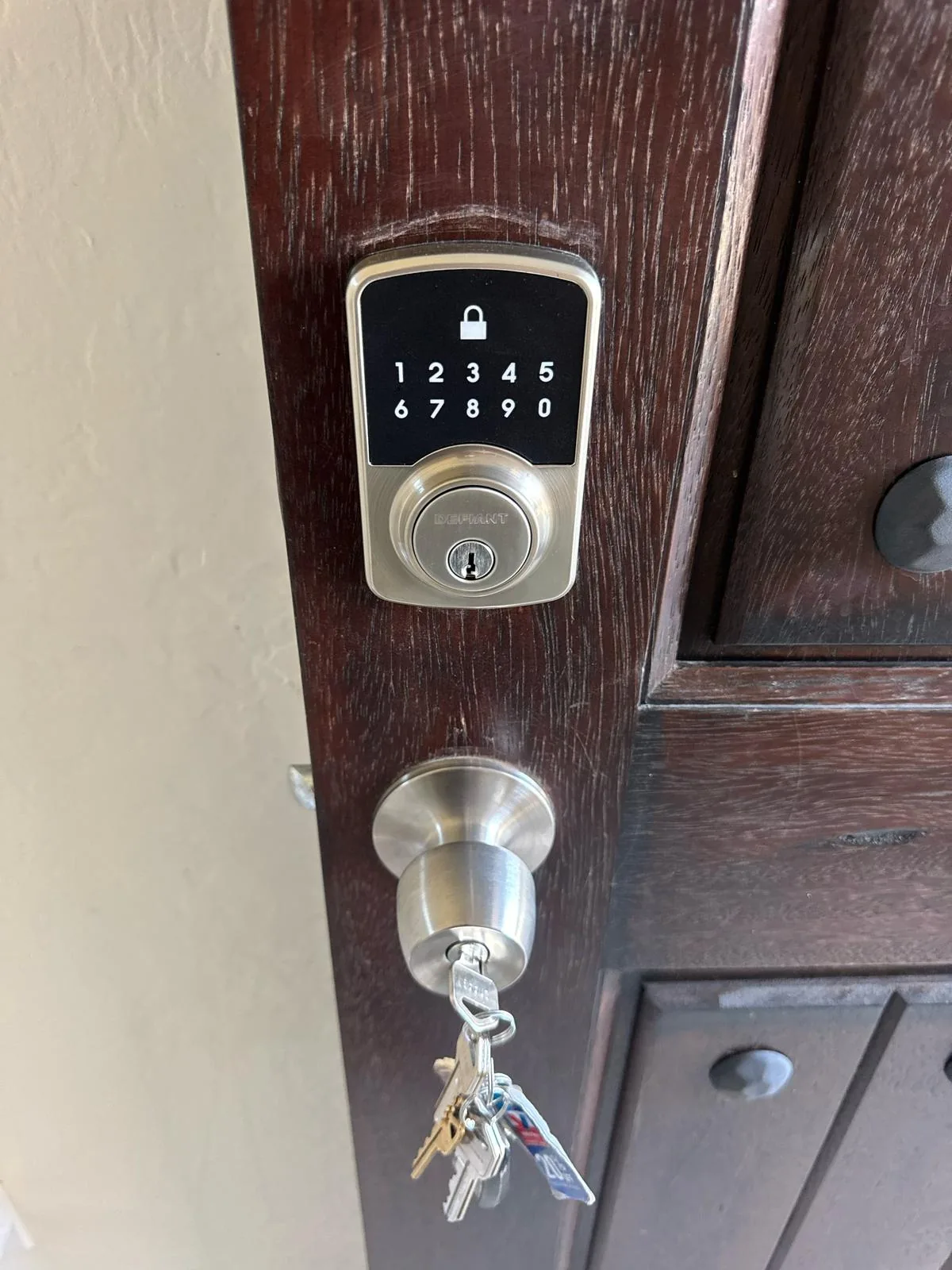 Phoenix mobile locksmith installing front door lock at customer home
